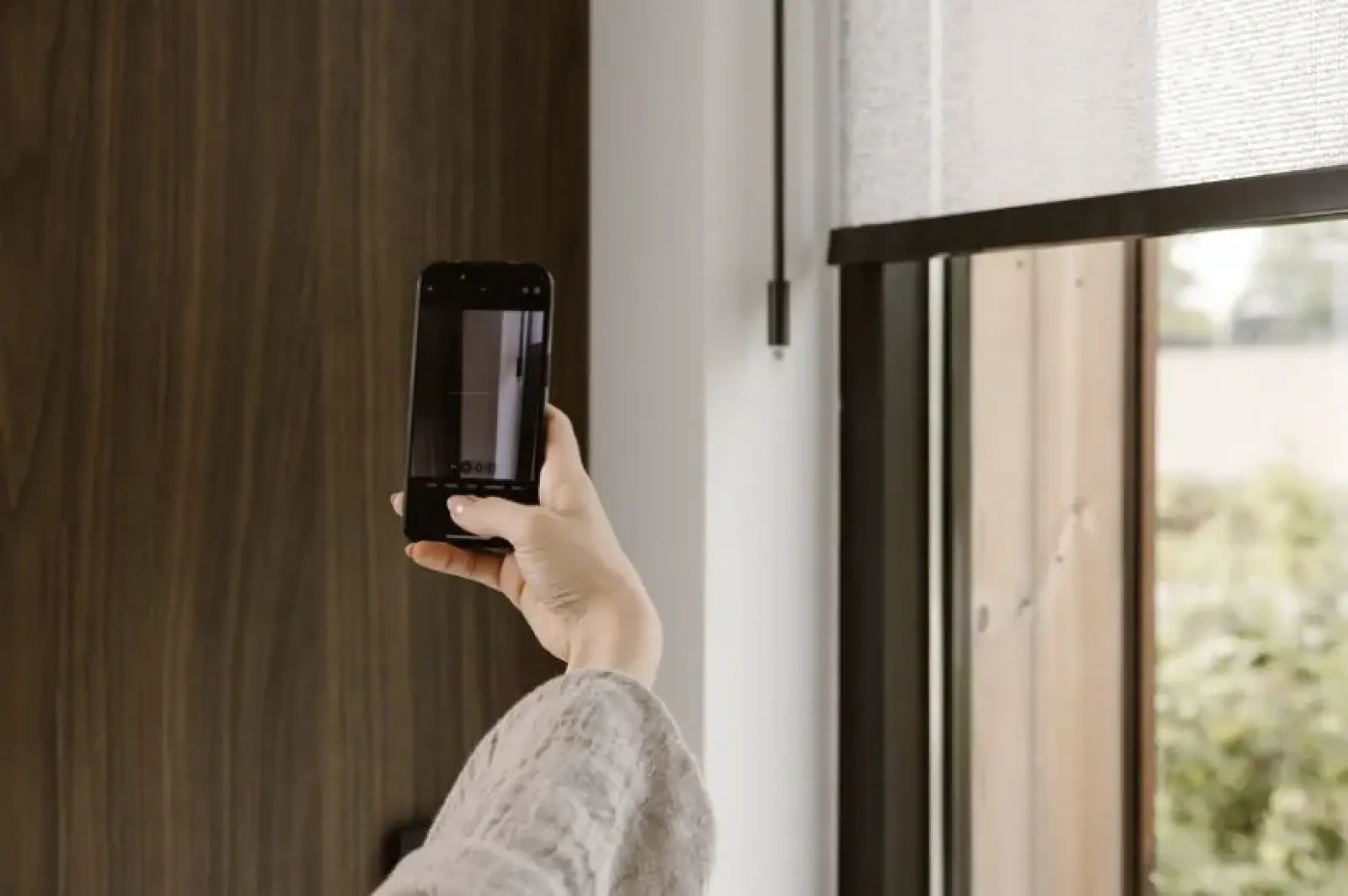 A MotionBlinds sheer roller blind operated from a phone app, MotionBlinds by Coulisse, supplied and installed by Custom Blinds Shutters & Awnings