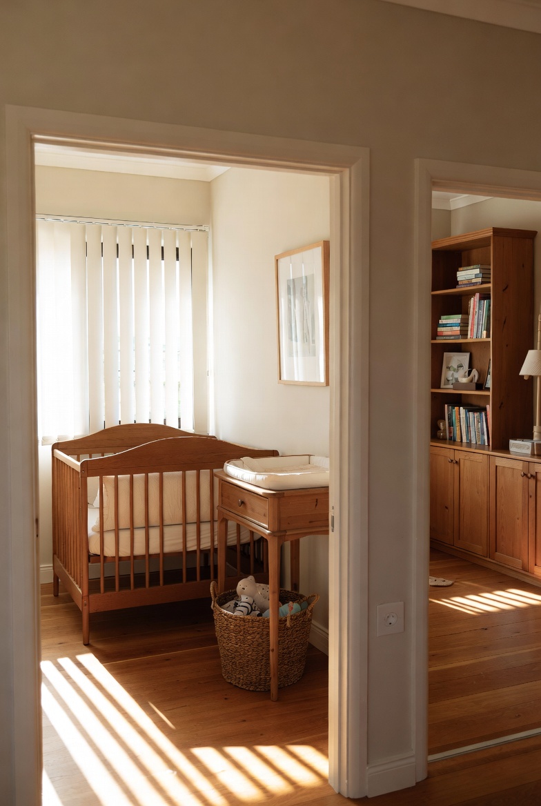 Vertical blinds filtering soft light in a nursery with wooden cot and warm timber floors, Custom Blinds Shutters & Awnings