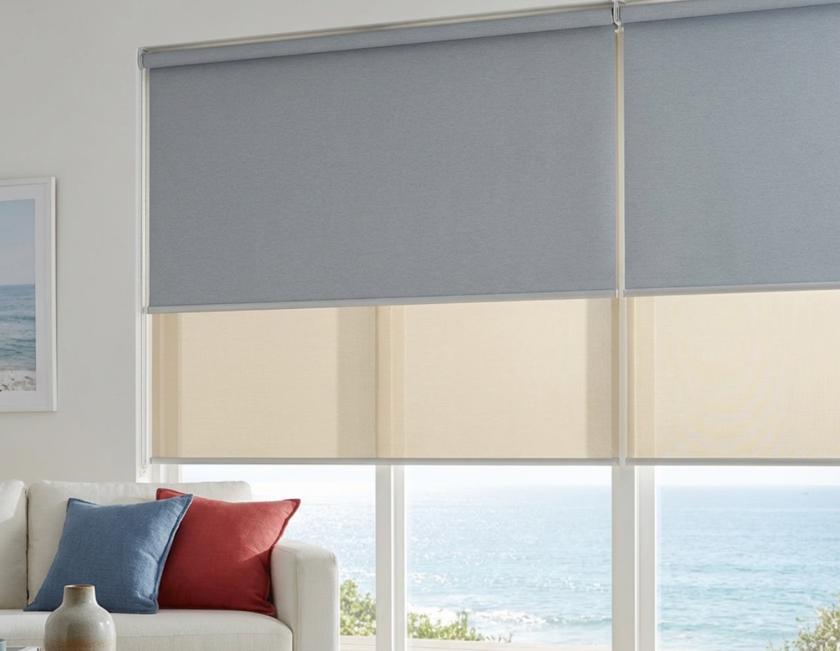 Duo roller blind with grey blockout and cream sheer fabrics over an ocean view, the sea-view specification Custom Blinds supplies to Mossel Bay