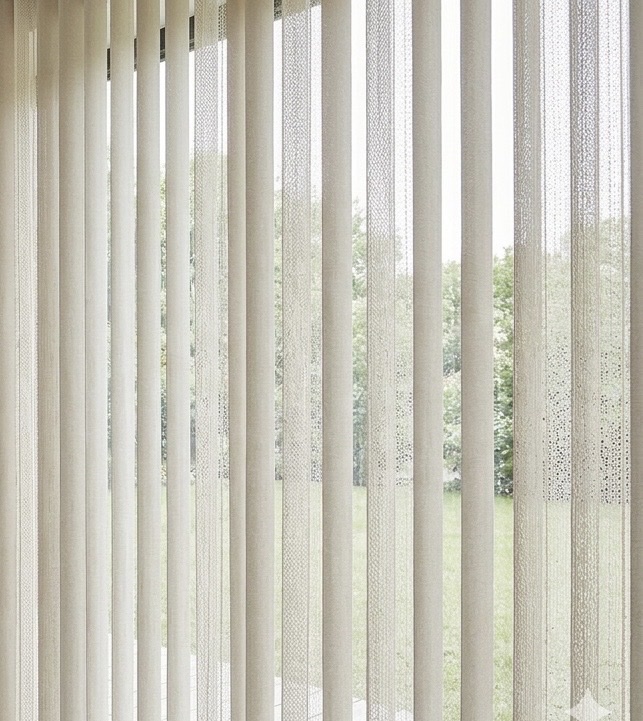 Vertishades sheer vertical blind fabric detail showing alternating opaque and sheer polyester vanes with textured weave, Custom Blinds Shutters & Awnings