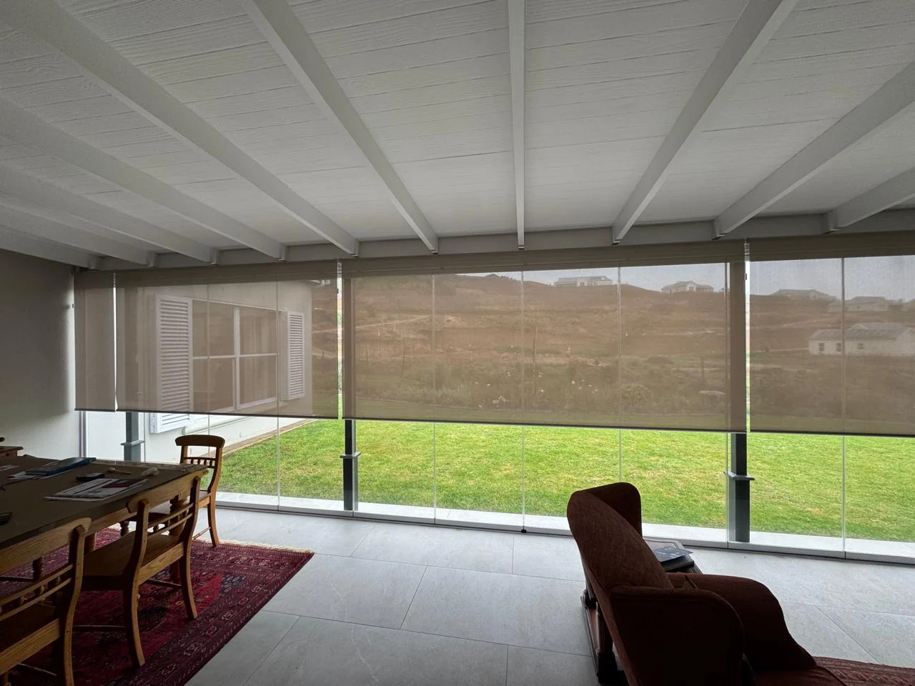 Sheer outdoor screen blinds expertly installed at Green Pastures Estate, Knysna by Custom Blinds Shutters & Awnings, Garden Route, South Africa