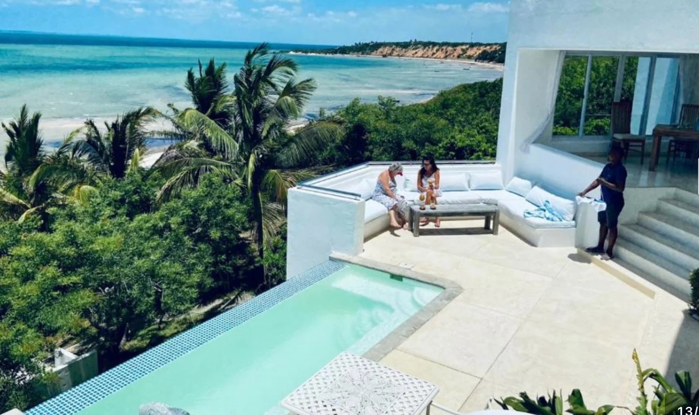 Infinity pool and white terrace overlooking the sea at Mykonos, Mozambique