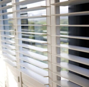 Custom Blinds® Shutters in a Pezula home. Views and Security
