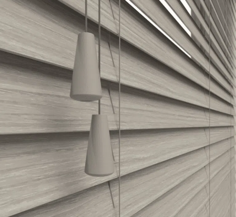 Taupe plaswood faux wood venetian blinds in a South African lounge, partly tilted open for light control