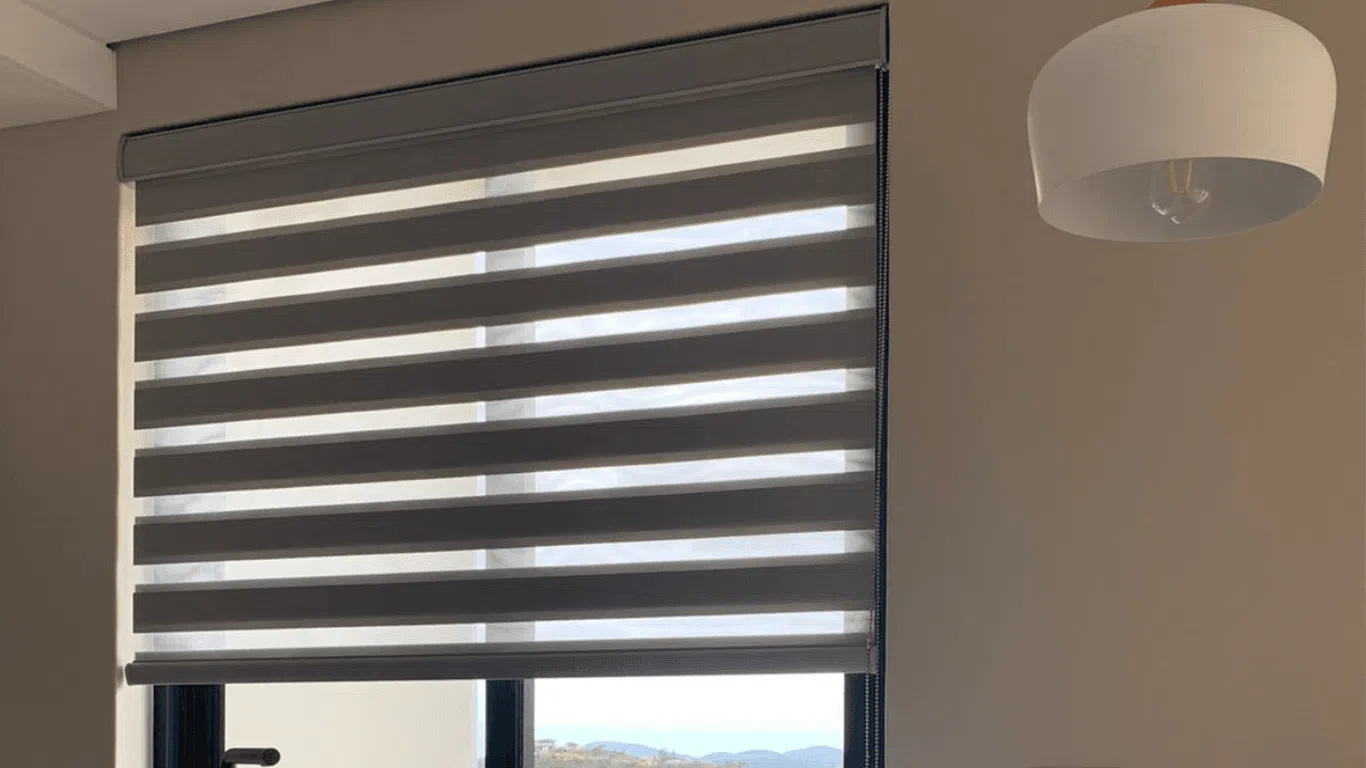 Double roller zebra blinds showing alternating sheer and opaque fabric bands in a South African home