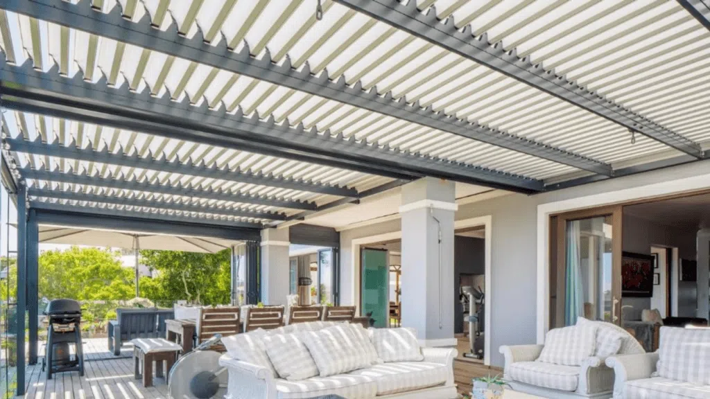 Custom colour aluminium louvred awning at Pezula Estate Knysna designed and installed by Custom Blinds