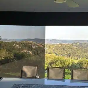 Custom Blinds Shutters & Awnings South Africa Simola Golf Estate Indoor table with four chairs faces a large window fitted with outdoor blinds, letting you enjoy lovely views and privacy at home. Garden Route & Online