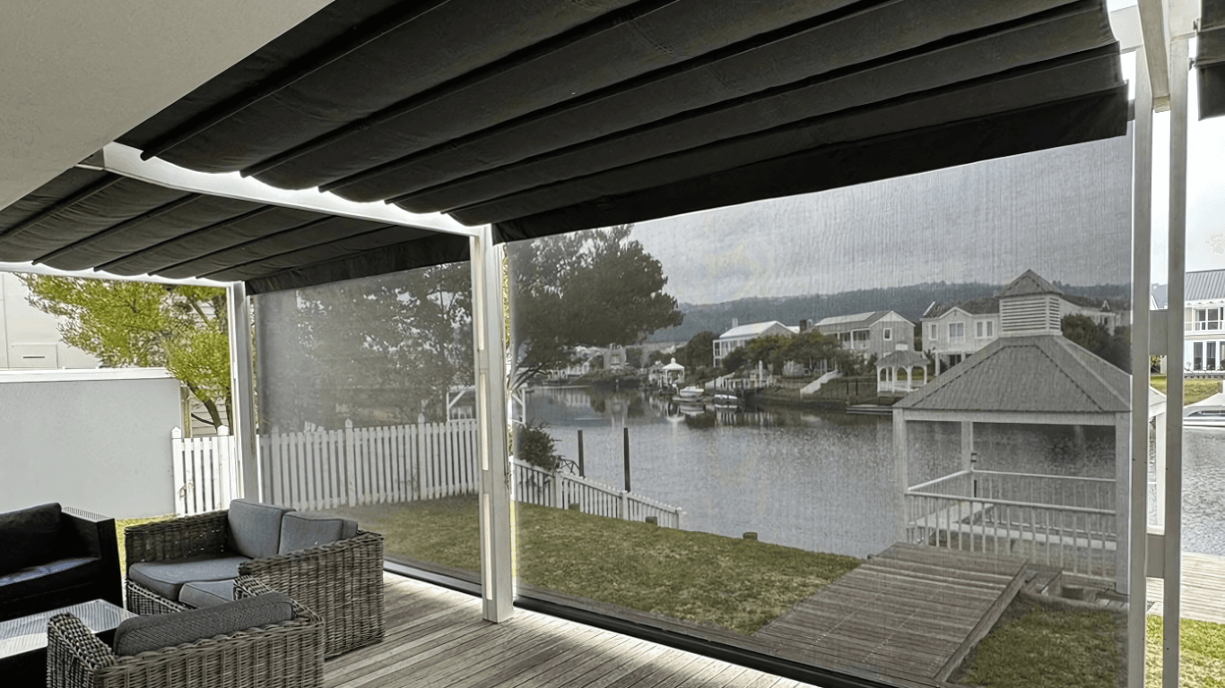Retractable awning and Sheerweave screen blinds on a Thesen Island waterfront property, Knysna