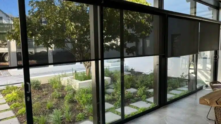 Sleek roller blinds in a modern South African interior showing clean lines and precise light control