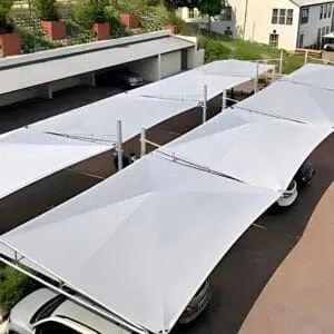 Shadeport system over cars at a large residential complex in Knysna installed by Custom Blinds