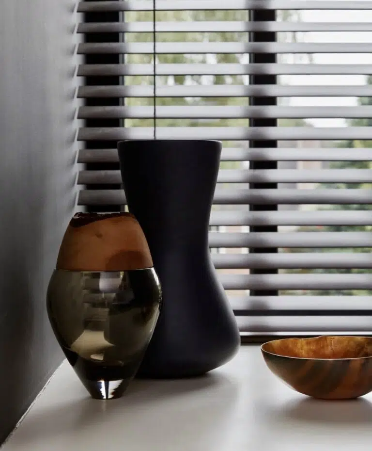 Wooden venetian blinds installed in a South African home showing natural basswood grain
