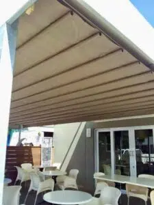 Outdoor seating area with awning