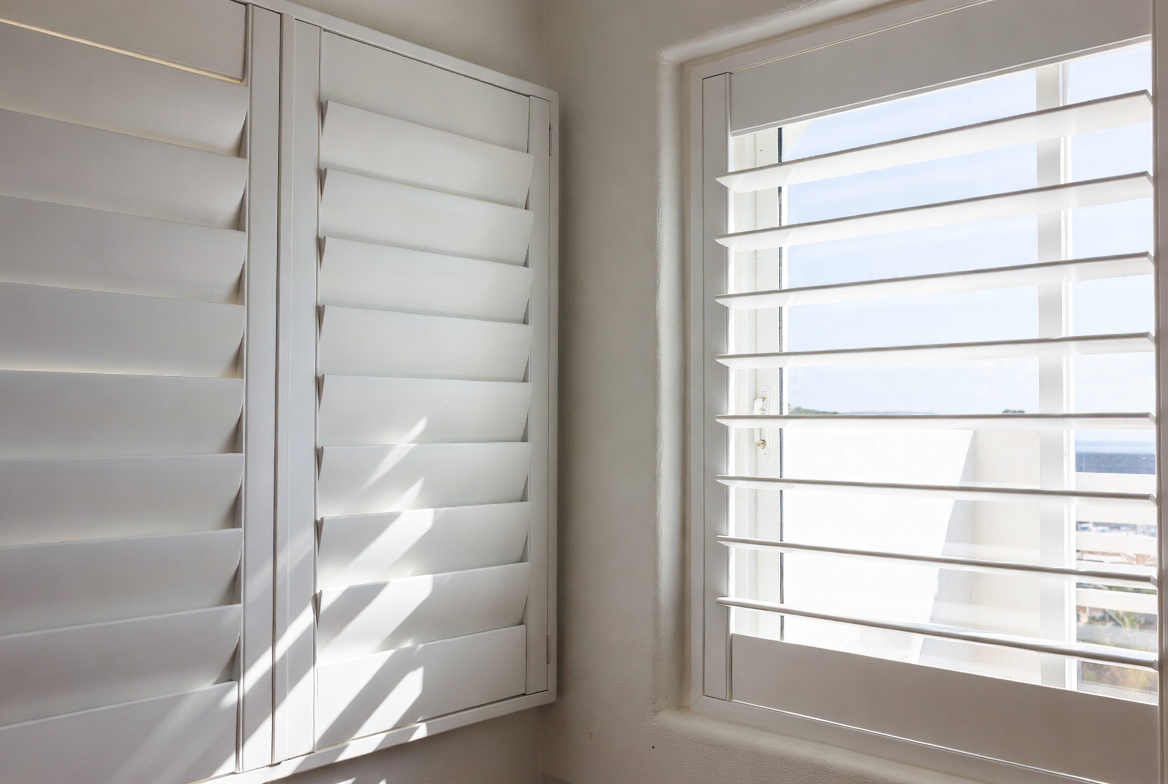 Custom Lifestyle PVC shutters installed in Buffalo Bay coastal home, Garden Route