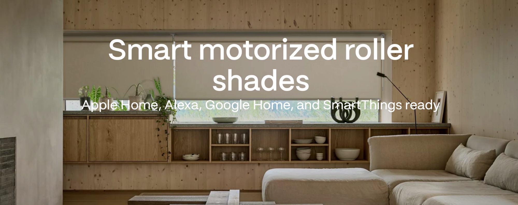 Motorised roller blinds in a contemporary coastal living room, MotionBlinds by Coulisse supplied by Custom Blinds Plettenberg Bay