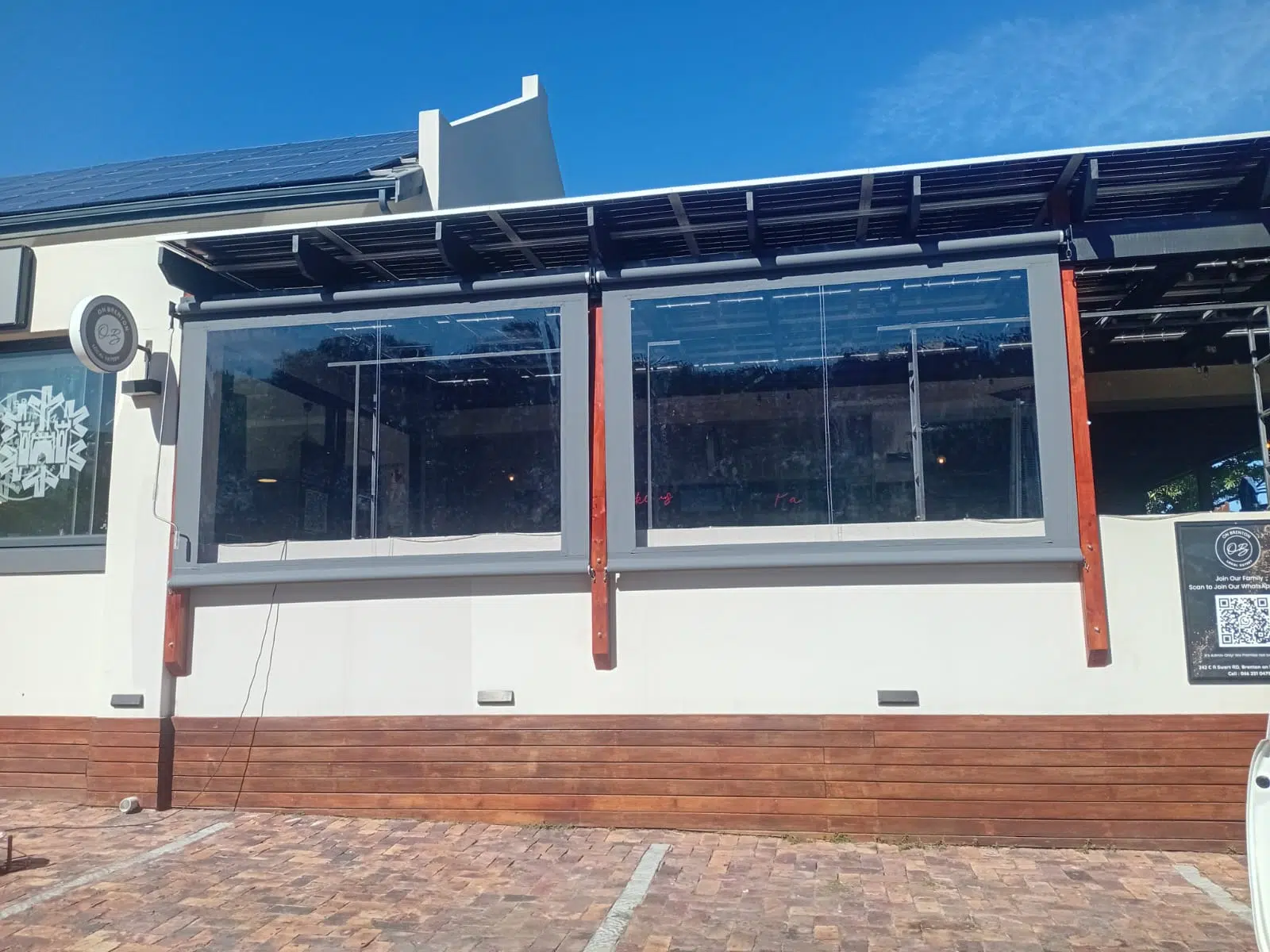 Clear PVC drop-down outdoor blinds at On Brenton restaurant, Brenton on Sea, Knysna. Designed and manufactured by Custom Blinds Shutters and Awnings.