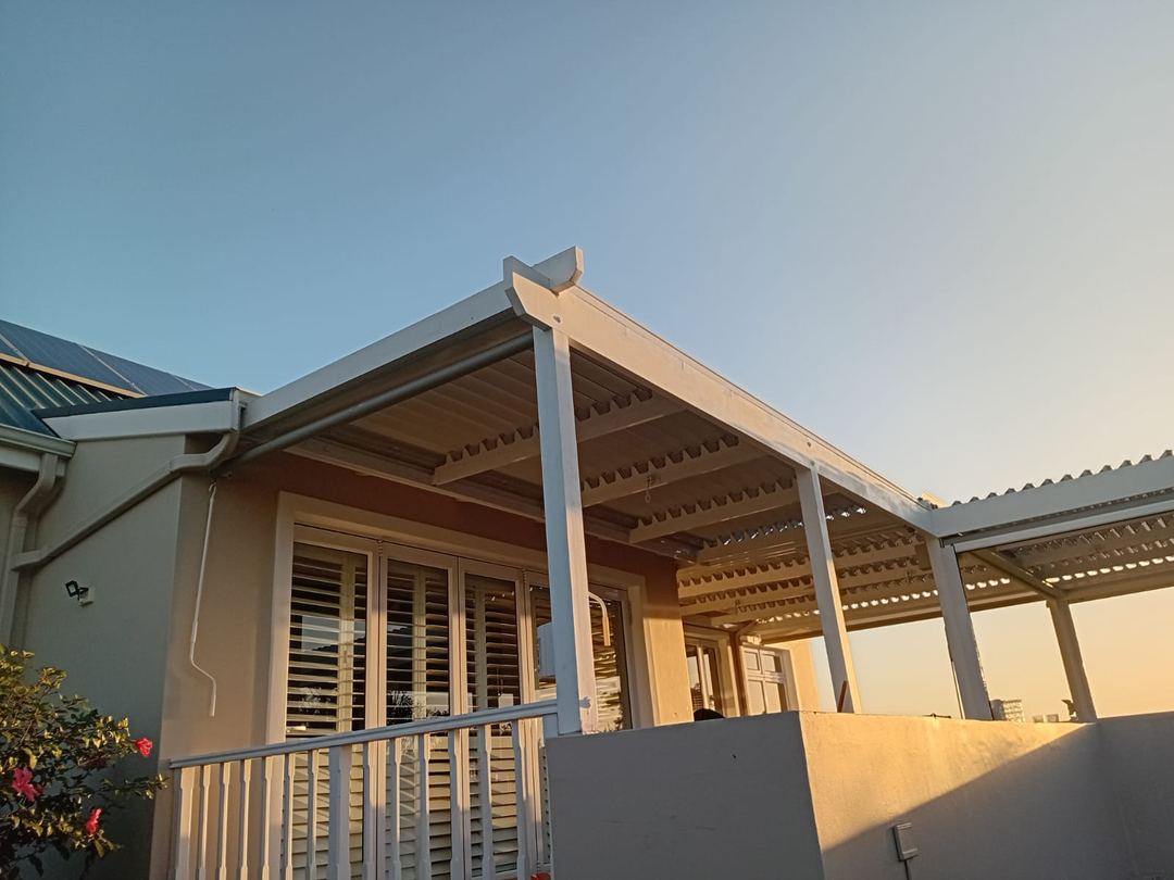 Aluminium louvred awning installed in Knysna by Custom Blinds Shutters and Awnings, Garden Route
