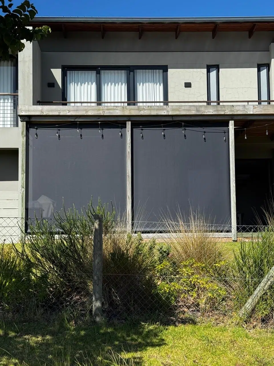 Outdoor blinds Knysna double-bay balcony installation by Custom Blinds®
