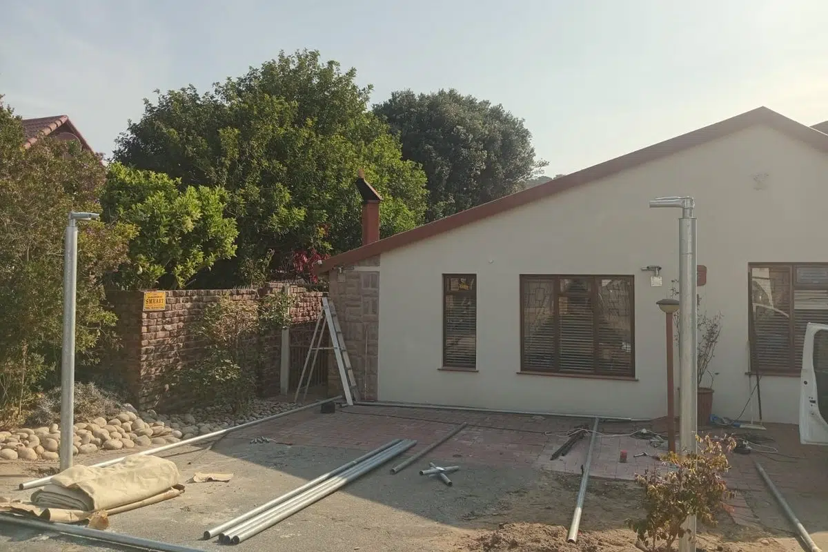 Galvanised steel shadeport posts set in dug footings in Plettenberg Bay | Custom Blinds Shutters and Awnings